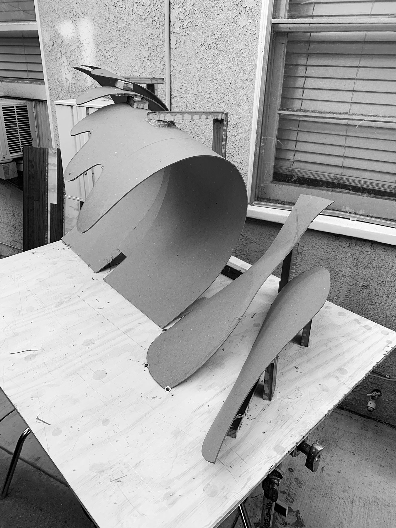 The sculpting process starts with a recycled chipboard core...