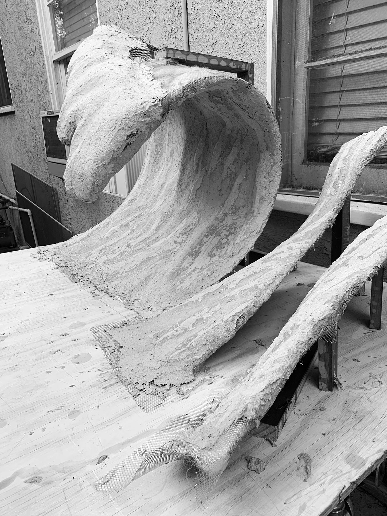 ...paper pulp with a binder is applied to the sculpture...